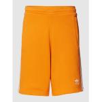 Orange Unifarbene adidas Originals Sweatshorts mit Reißverschluss aus Baumwolle für Herren Größe L 