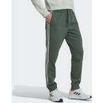 Adidas Sportswear Sporthose »essentials Fleece Tapered Cuff 3streifen Hose«, Grün, Greoxi/lingrn