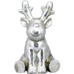 Silberne Tierfiguren für den Garten aus Kunststein 
