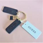 Schwarze Guess Schlüsselanhänger & Taschenanhänger für Damen 