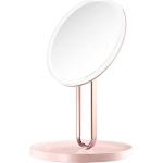 Pinke Spiegel vergrößernd 