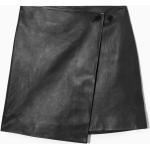 Schwarze COS Mini Lederröcke mit Knopf aus Leder für Damen Größe L 