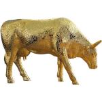 Goldene Deko-Kühe für den Garten aus Kunststein 