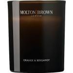 Sandfarbene Molton Brown Orange & Bergamot Duftkerzen mit Blumenmotiv 