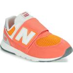 Orange New Balance 574 Low Sneaker für Kinder Größe 24 