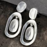 Silberne Vintage Hippie Ohrringe aus Metall für Damen 