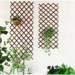 Braune Wandspaliere aus Holz ausziehbar 