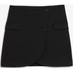 Schwarze Monki Mini Röcke mit Knopfleiste für Damen Größe XS 