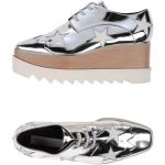 Silberne Stella McCartney Metallic-Sneaker mit Schnürsenkel aus Kunstleder Gefüttert für Damen Größe 39,5 für den für den Winter 